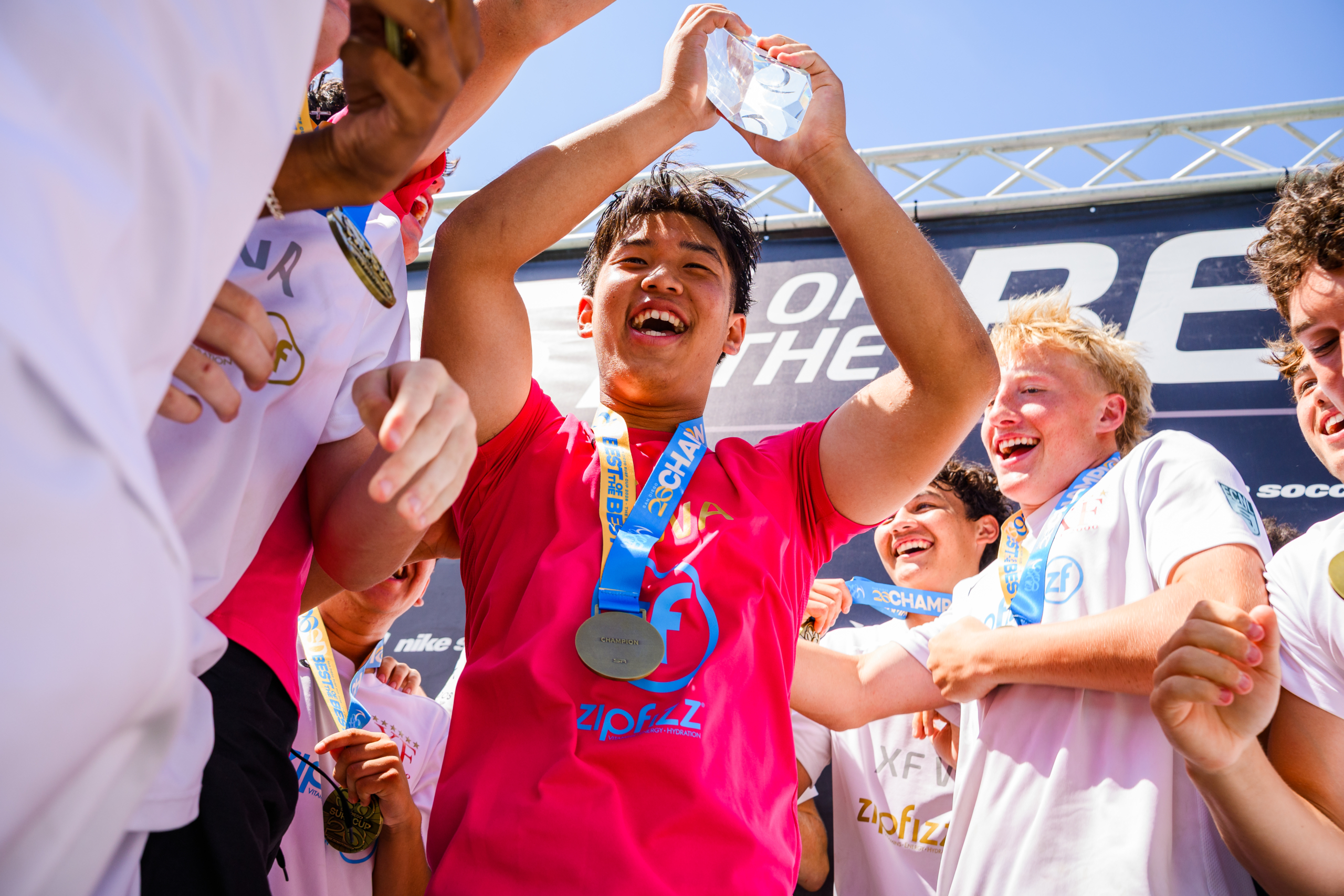 Crossfire FC lifting their trophy after winning the championship